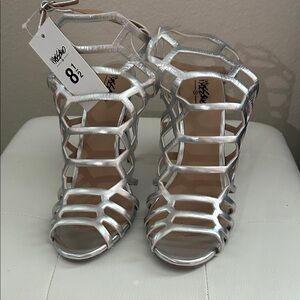 NWT/Winter Metallic Silver Caged Heels.  Moving Sale!